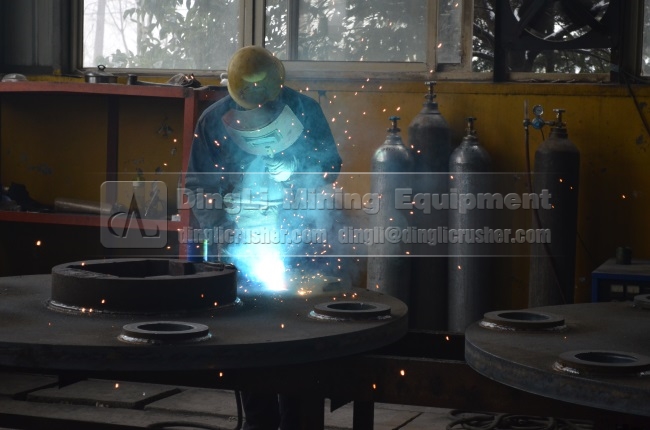 Electric welder in the workshop