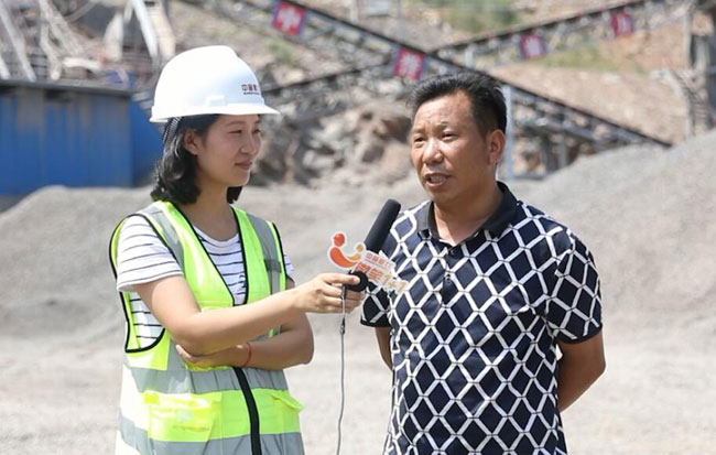 Mr. Tang the plant owner is being interviewed